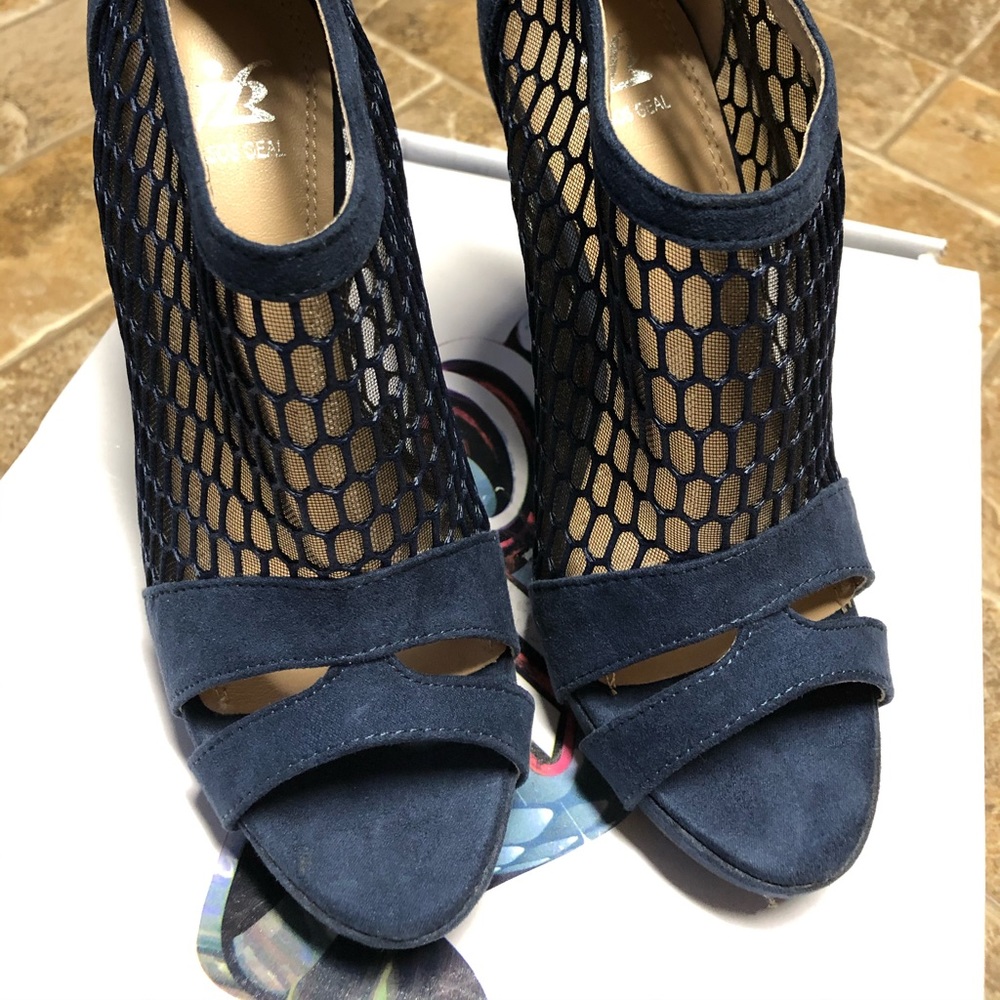 Blue Suede Caged shoes with heels